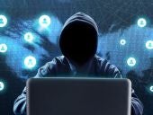 Hacker using laptop