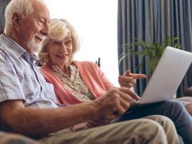 older Couple using laptop