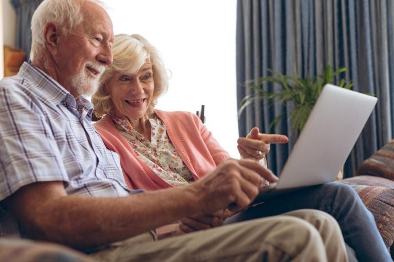 older Couple using laptop