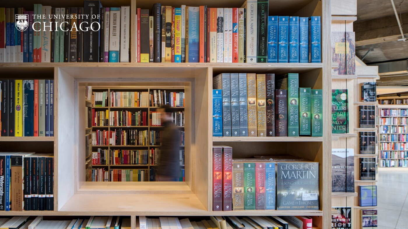 University of Chicago library stacks with George Martin's Game of Thrones books featured prominently.