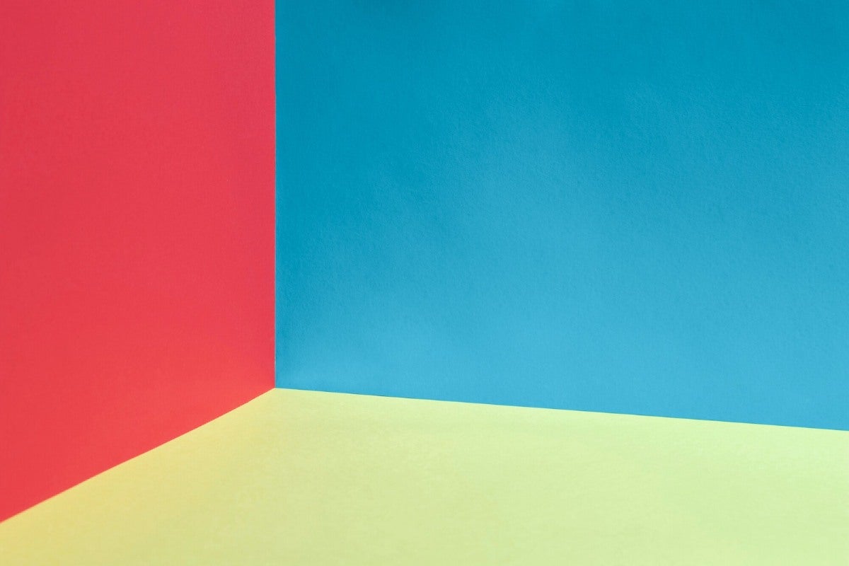 An abstract painting with pink, blue, and green shades.