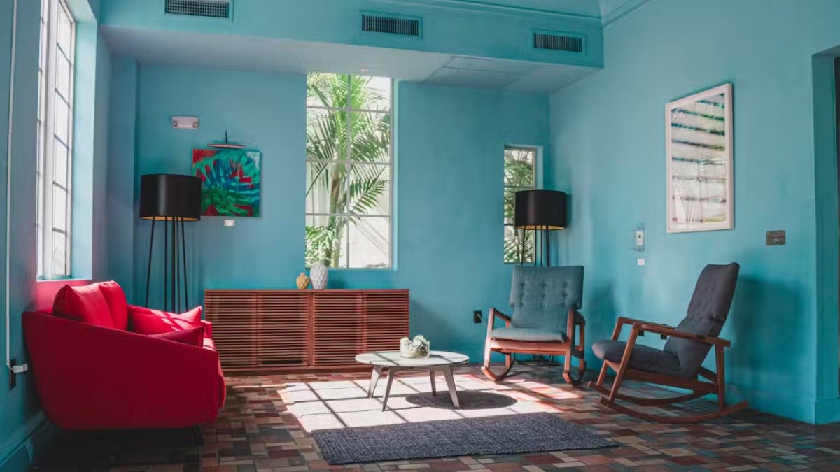 Image of a living area with colorful walls.