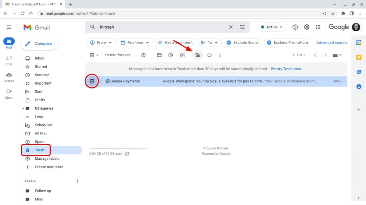 Screenshot that shows a single Gmail in trash selected, with an arrow pointing at the Move to folder icon.