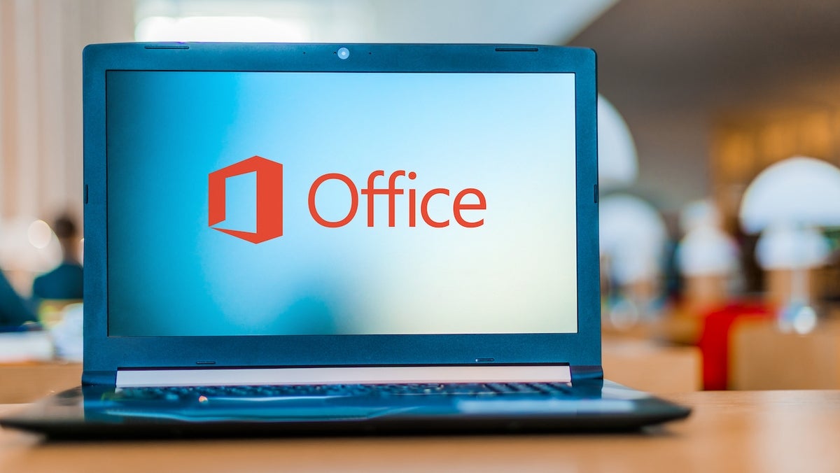 Laptop computer displaying logo of Microsoft Office.