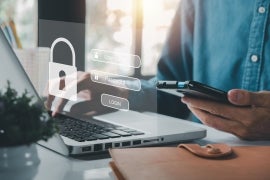 Man hand typing on keyboard with login and password in cybersecurity concept.