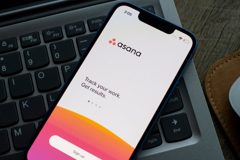 Portland, OR, USA - Dec 6, 2021: Asana mobile app login page is seen on an iPhone. Asana's web and mobile apps are designed to help users stay on track, keep projects organized, and hit deadlines.