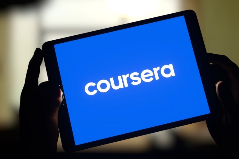 Logo of online learning platform Coursera displayed on tablet screen.