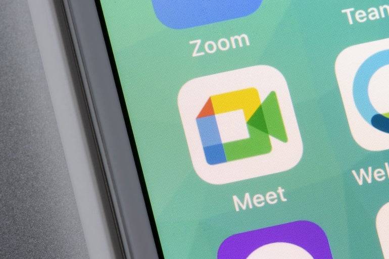 Google Meet mobile app icon is seen on an iPhone. Google Meet is a real-time meeting and video-communication service developed by Google.