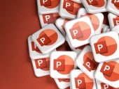 Logos of the Microsoft Office component Powerpoint on a heap. Copy space. Web banner format.