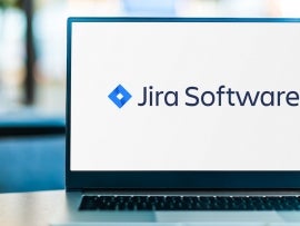 Laptop computer displaying logo of Jira.