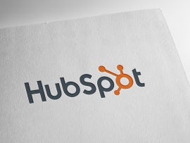 HubSpot logo on textured paper
