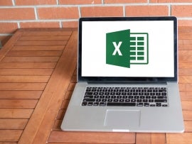 Microsoft Excel logo on a laptop.