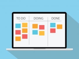 A kanban board on a laptop.