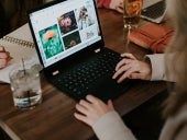 Woman working on her laptop.