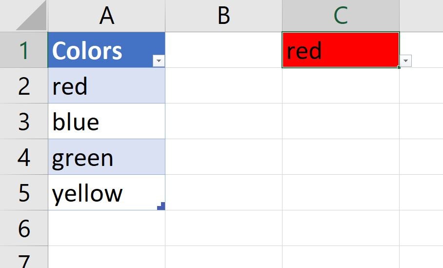 Excel table with Colors red, blue, green, and yellow listed in column A and the word red with a red background in cell C1