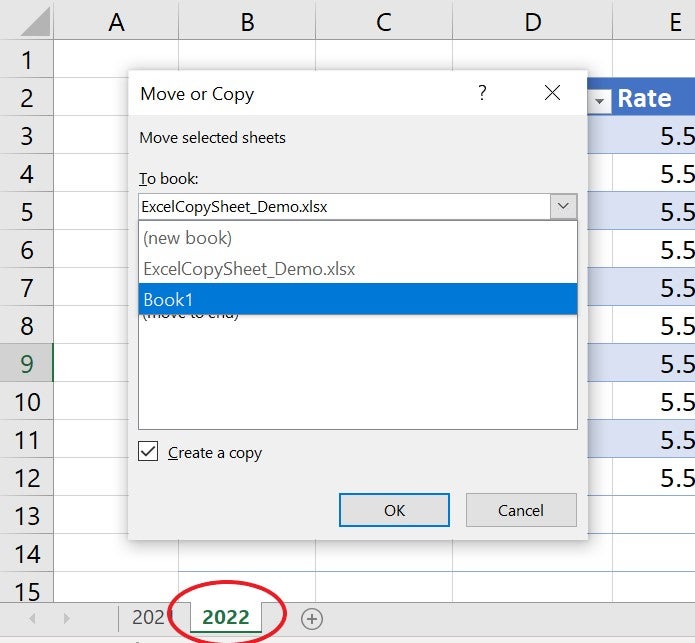 Choose the target workbook and check the Create A Copy option.