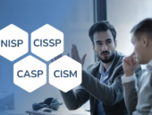 Men talking with NISP, CISSP, CASP, CISM written by them.