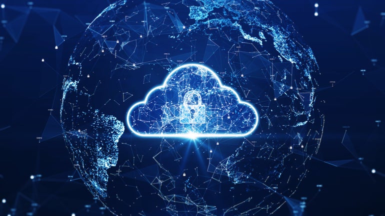 A cloud and security symbol over a globe of connected internet of things devices.