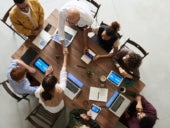 People at table working on project management