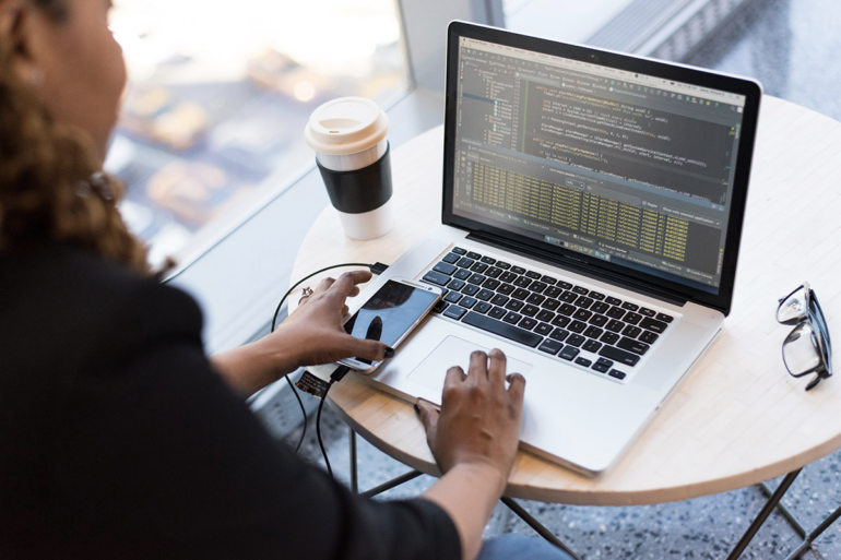 An employee using the Exams Digest 2023 All-In-One Training Bundle.