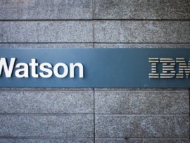 A sign with the Watson and IBM logos.