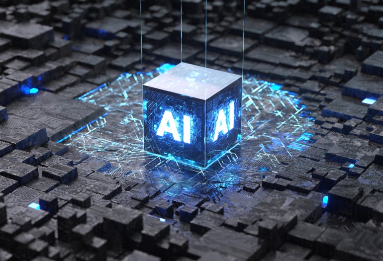 A cube with AI written on it.