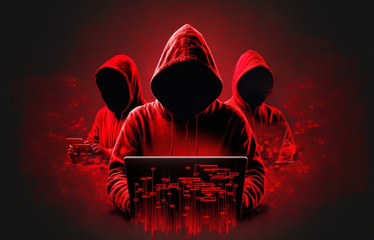 Faceless hackers in red shadows using laptops, along with abstract digital symbols.