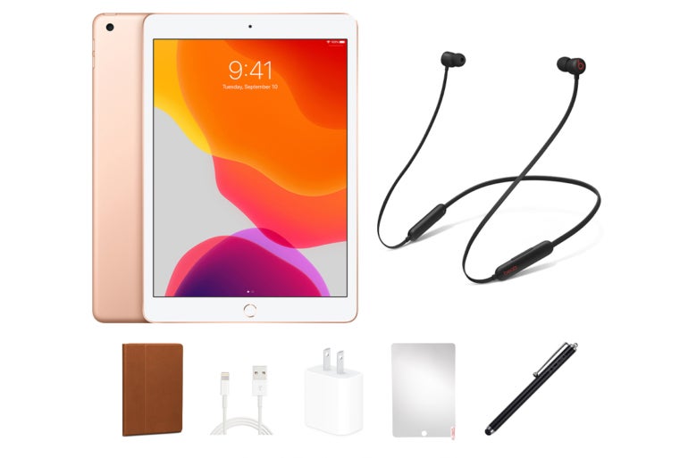 An iPad and Beats headphones with all of the accessories.