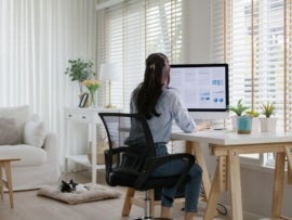 Woman working from her home office.