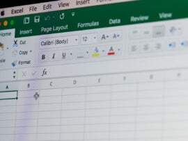 Microsoft office excel spreadsheet on laptop screen close up.
