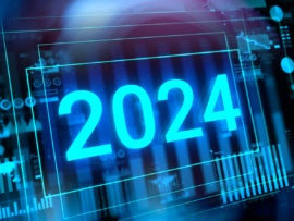 New 2024 year digits with reflection and virtual charts and graphs in the background.