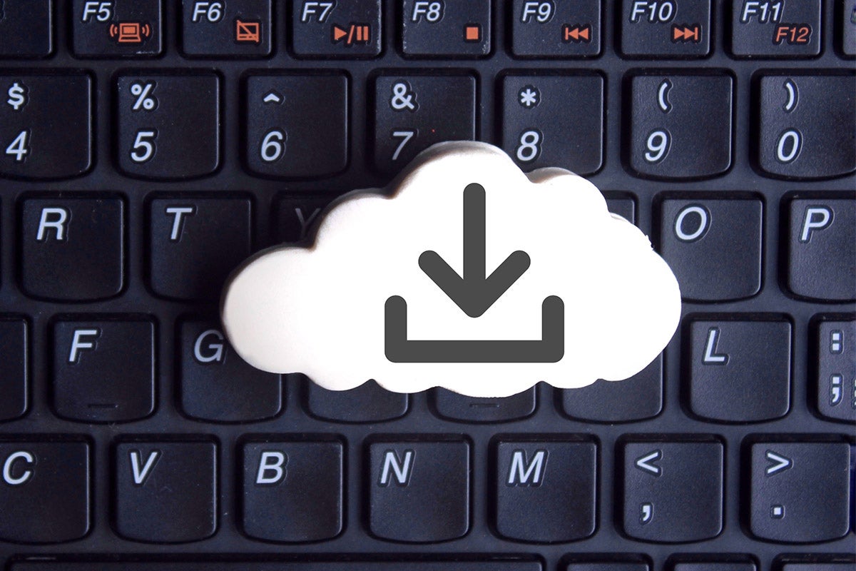 Top view of a keyboard with a cloud storage icon on top.
