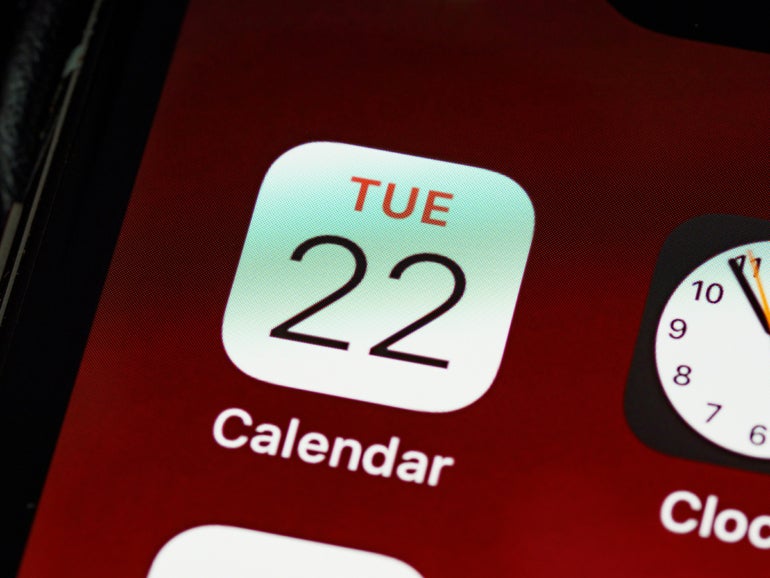 Close up shot of an iPhone display showing the Calendar app.