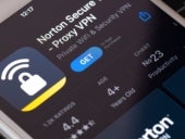Smartphone with Norton secure VPN app logo.