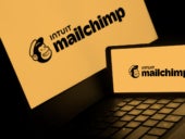Mailchimp logo is displayed on smartphone.