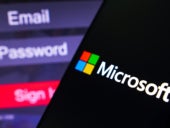 Microsoft Corporation logo is displayed on a smartphone screen, next to a login screen, with email, password and sign in.