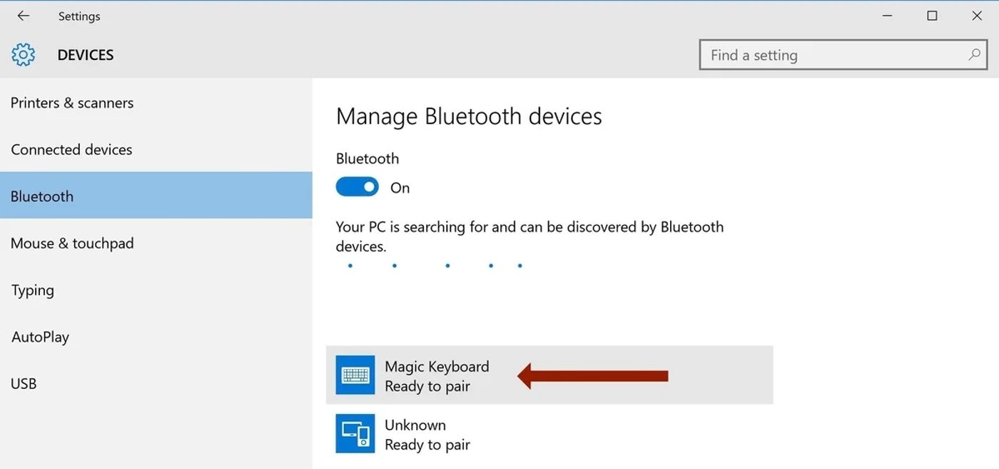 Windows PC 将显示可用的蓝牙配件。 单击妙控键盘。