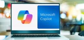 Laptop computer displaying logo of Microsoft 365 Copilot.