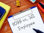 1099 vs. W2 Employee sign on the piece of paper.