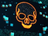 Orange glowing skull digital illustration on dark screen texture background.