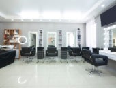 Panoramic view of a hair salon.