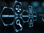 Hand interacting with compliance, regulations and standards icons on virtual interface.