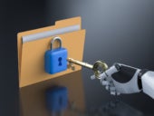 A robotric hand inserting a key into a lock of a folder.