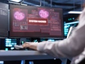 Stock photo image of a computer monitor indicating a network security breach.