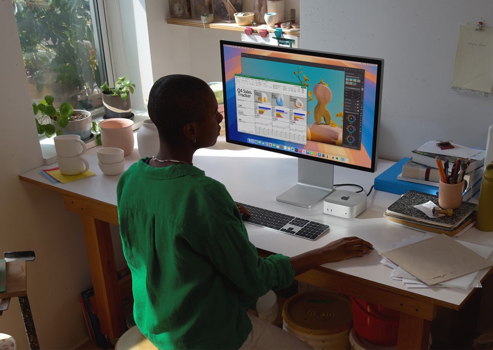 This example of a home office setup shows the Mac Mini with Apple accessories.