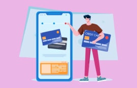 Man interacting with a huge smartphone while holidng a credit card.