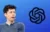 Photo of OpenAI's CEO Sam Altman with the company's logo.