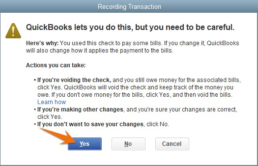 A QuickBooks Desktop confirmation dialog warning the user about voiding a check and its impact on bill payments. The "Yes" button is highlighted with an arrow, indicating the user's action to proceed.