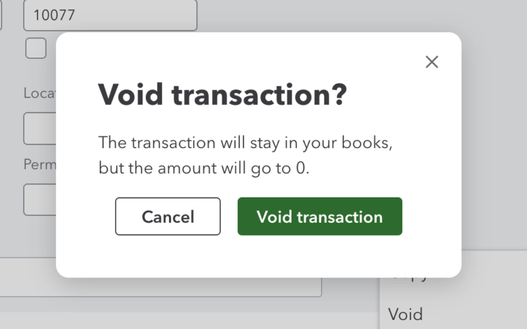 QuickBooks Online confirmation dialog asking, "Void transaction?" with an explanation that the transaction will remain in the books but its amount will be set to zero. The dialog includes two buttons: "Cancel" and "Void transaction."