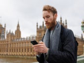 Portrait of a man with a smartphone in his hands